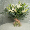 White oriental lilies, white eustoma and eucalyptus, gift to offer for congratulations, for graduation, engagements, bridal showers, new baby